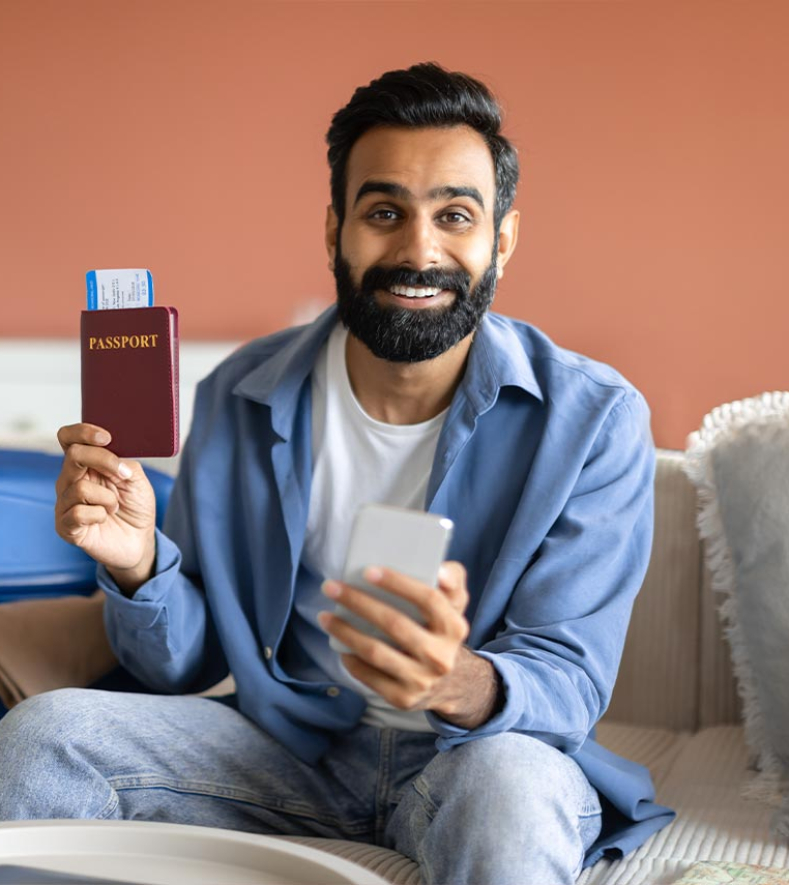 indian-traveler-man-with-phone-showing-boarding-pa-2023-06-20-18-47-20-utc